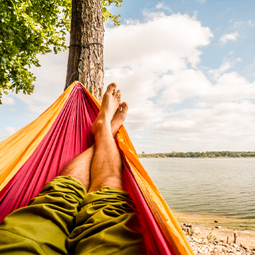 a man relaxing with a scenery of greenery
