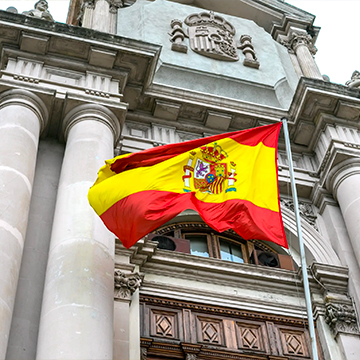 spain flag in front of the court house
